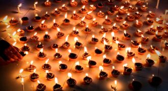 A vibrant collection of lit diyas symbolizing Diwali, the festival of lights, celebrating warmth and prosperity.