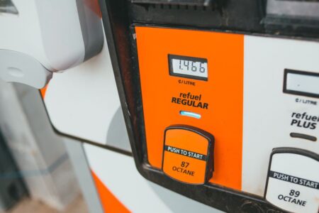 Detailed view of a gas pump showing price and octane level 87.