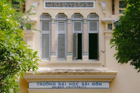 Facade of Saigon University in Ho Chi Minh with traditional architectural features.